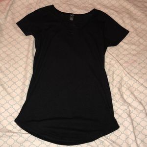 Black, cross topped shirt.